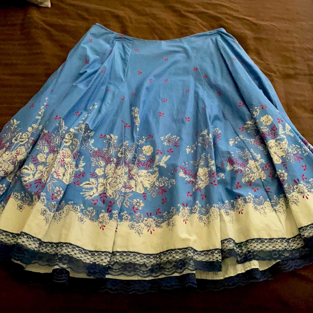 Knee-length, blue/white print skirt; never worn; size XL